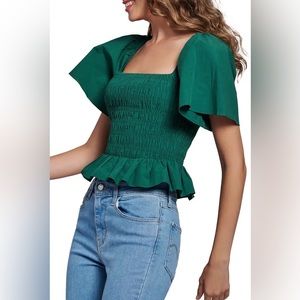Gorgeous top 🦚
